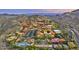 Aerial view of large community with resort-style amenities and mountain views at 10653 N 10Th Pl, Phoenix, AZ 85020