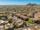 Aerial view showcasing home's location within a community, near mountains at 10653 N 10Th Pl, Phoenix, AZ 85020
