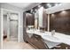 Elegant bathroom with double vanity and walk-in shower at 10653 N 10Th Pl, Phoenix, AZ 85020