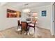 Small dining area with a round table and four chairs, near the kitchen at 10653 N 10Th Pl, Phoenix, AZ 85020