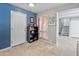Inviting entryway with built-in shelving and tiled flooring at 10653 N 10Th Pl, Phoenix, AZ 85020