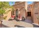 Charming patio area with seating and decorative plants at 10653 N 10Th Pl, Phoenix, AZ 85020