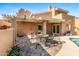Spacious patio with seating area adjacent to the pool at 10653 N 10Th Pl, Phoenix, AZ 85020