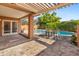 Inviting pool area with patio furniture, offering a relaxing outdoor space at 10653 N 10Th Pl, Phoenix, AZ 85020