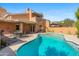 Expansive pool and patio area with seating and mountain views at 10653 N 10Th Pl, Phoenix, AZ 85020