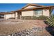 Single-story house with two-car garage and well-maintained front yard at 12422 W Ginger Dr, Sun City West, AZ 85375