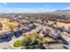 Aerial view of houses in a residential neighborhood near a golf course at 22821 S 212Th St, Queen Creek, AZ 85142