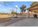 Landscaped backyard with pool, patio, and basketball court at 22821 S 212Th St, Queen Creek, AZ 85142