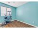 Spacious bedroom with wood floors and a cat tree at 22821 S 212Th St, Queen Creek, AZ 85142