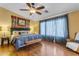 Spacious bedroom with wood floors and large windows at 22821 S 212Th St, Queen Creek, AZ 85142