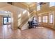 Bright and spacious entryway with staircase and tiled floors at 22821 S 212Th St, Queen Creek, AZ 85142