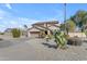 Two-story house with desert landscaping and a two-car garage at 22821 S 212Th St, Queen Creek, AZ 85142
