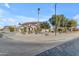 Two-story house with a desert landscaping and a long driveway at 22821 S 212Th St, Queen Creek, AZ 85142