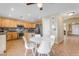 Open kitchen with island and seating area at 22821 S 212Th St, Queen Creek, AZ 85142