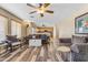Living room with hardwood floors and view to kitchen at 22821 S 212Th St, Queen Creek, AZ 85142