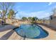Inviting kidney-shaped pool with waterfall feature at 22821 S 212Th St, Queen Creek, AZ 85142