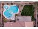 Aerial view of the backyard oasis, featuring a pool and spa at 25667 N 68Th Ln, Peoria, AZ 85383