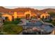 Luxury home with a large pool, spa, and mountain views at 4308 N Sage Creek Cir, Mesa, AZ 85207