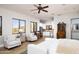Guest bedroom suite with kitchenette and sitting area at 4308 N Sage Creek Cir, Mesa, AZ 85207