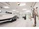 Finished garage with boat, motorcycles, and storage at 4308 N Sage Creek Cir, Mesa, AZ 85207