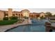 Resort-style pool and spa with a waterfall feature at 4308 N Sage Creek Cir, Mesa, AZ 85207