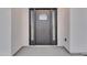 Modern front door with sleek black finish and sidelights at 433 W Saddle Mountain Road --, Phoenix, AZ 85086