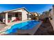 Clean rectangular pool with a spacious deck at 1209 W Fruit Tree Ln, San Tan Valley, AZ 85143