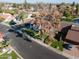 House with tile roof and a large tree in the front yard at 1302 E Steamboat Bend Dr, Tempe, AZ 85283