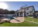 Stunning backyard oasis featuring a pool and diving board at 1302 E Steamboat Bend Dr, Tempe, AZ 85283