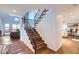 Elegant staircase with decorative tile accents and metal railing at 13227 N Mimosa Dr # 109, Fountain Hills, AZ 85268