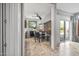 Bright breakfast nook with glass table and four chairs, adjacent to kitchen at 13806 W Via Manana --, Sun City West, AZ 85375