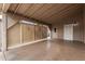 Covered carport with concrete flooring and screened sides at 1672 E Augusta Ave, Chandler, AZ 85249