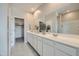 Bathroom with double sink vanity and walk in closet at 24969 N 173Rd Ln, Surprise, AZ 85387