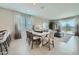 Dining Area includes views of living area and patio. Decorative lighting and lots of natural light at 24969 N 173Rd Ln, Surprise, AZ 85387