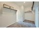 Walk-in closet with white walls and shelves, providing ample storage space at 24969 N 173Rd Ln, Surprise, AZ 85387