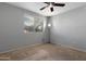 Bright bedroom with ceiling fan and neutral walls at 3302 N 7Th St # 226, Phoenix, AZ 85014