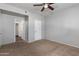 Bedroom with ceiling fan and access to bathroom at 3302 N 7Th St # 226, Phoenix, AZ 85014