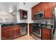 Well-equipped kitchen with stainless steel appliances and granite countertops at 3302 N 7Th St # 226, Phoenix, AZ 85014