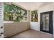 Private patio with door access and tree views at 3302 N 7Th St # 226, Phoenix, AZ 85014