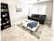Spacious living room with built-in bookcase and comfortable seating at 4660 E Torrey Pines Ln, Chandler, AZ 85249