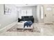 Bright living room featuring a cozy sofa and stylish coffee table at 4660 E Torrey Pines Ln, Chandler, AZ 85249