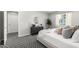 This bedroom features a gray accent wall, patterned carpet and a decorative dresser with round mirror above at 735 E Calavar Rd, Phoenix, AZ 85022