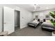 Charming bedroom featuring twin beds, soft gray carpet, and ample natural light at 735 E Calavar Rd, Phoenix, AZ 85022