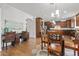 Kitchen features breakfast nook with glass top table and four chairs at 23321 N 41St St, Phoenix, AZ 85050