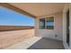Covered patio overlooking a backyard with views at 25353 N 176Th Ave, Surprise, AZ 85387