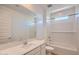 Bright bathroom featuring a single sink vanity and a shower-tub combination at 25353 N 176Th Ave, Surprise, AZ 85387