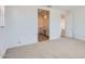 Bright bedroom with an ensuite bathroom featuring dual sinks and modern fixtures at 25353 N 176Th Ave, Surprise, AZ 85387