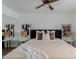 Calm bedroom with a queen bed, stylish decor, and ceiling fan at 3500 N Hayden Rd # 1902, Scottsdale, AZ 85251