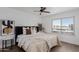 Spacious bedroom featuring a comfortable bed and large window at 3500 N Hayden Rd # 1902, Scottsdale, AZ 85251