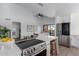 Open concept kitchen boasts stainless steel appliances and an island at 3500 N Hayden Rd # 1902, Scottsdale, AZ 85251